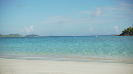 Fototapeta na wymiar Tide carrying the blue Caribbean water down the shore for green screen