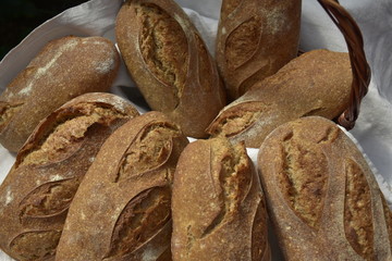 Loaves of fresh artisan rye sourdough bread.