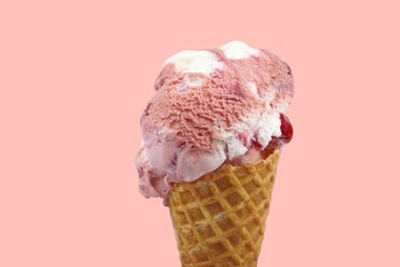 Ice cream in cone on pink background
