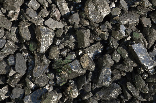 
Coal anthracite enriched with a large grade, as a background.