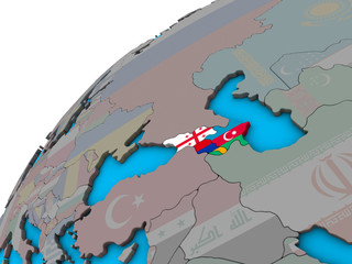 Caucasus region with national flags on 3D globe.