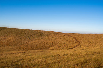 Fototapeta premium Beautiful view landscape with wheat field on top of mountain and blue sky