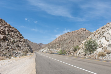 Interstate 8 connects San Diego to Phoenix, with a portion of the highway (Jacumba, California) crossing mountains of bare rock