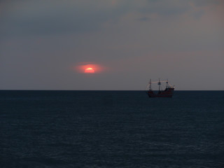pirate ship at sunset