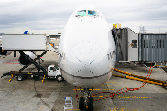 Head-on view of the nose of an airplane as it's prepared for dep
