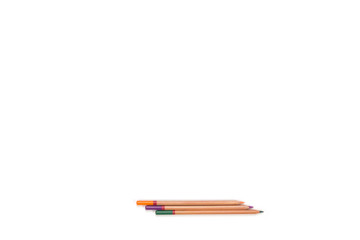 Colored pencils on isolated white background