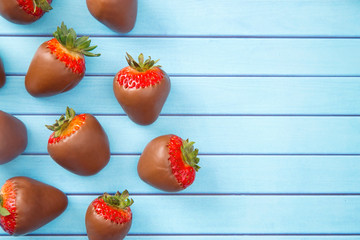 Chocolate Covered Strawberries on a Wooden Table