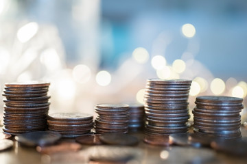 Stacks of coins against light
