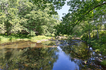 Fototapeta na wymiar Wide view of Sandy Stream in Unity Maine in the summer.