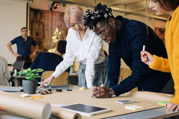 Corporate Teamwork - Group of Mixed Race People Working Together