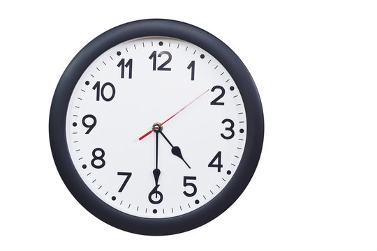 Time concept with black clock at  half past four