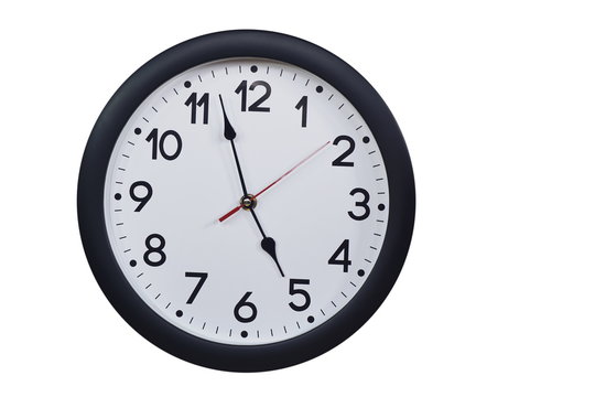Time concept with black clock at five to five am or pm