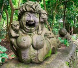 Fototapeta na wymiar Traditional Balinese stone sculpture art and culture at Bali, Indonesia