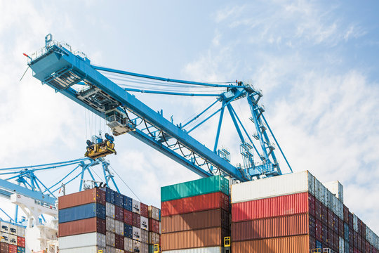 Shipping containers and a container crane