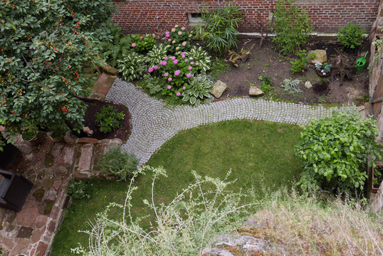 Brick path in a garden seen from above