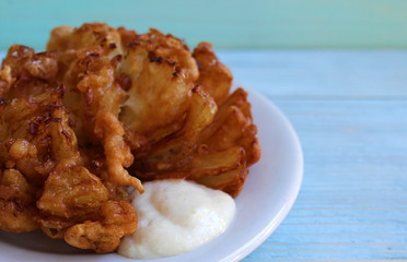 fried onion sliced like a lotus flower