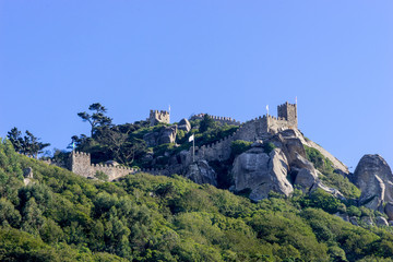 Obraz premium View from downtown of Sintra to a half part of the medieval Castle of the Moors on a hilltop,in Portugal near Lisbon; Sintra Cultural Landscape, UNESCO World Heritage Site