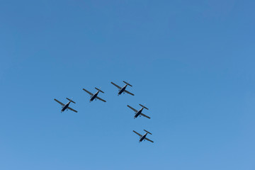 Fototapeta na wymiar Five airplanes are flying in the sky