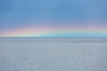 Rainbow over ocean