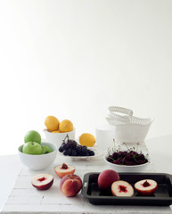 Organic Fruits on white table