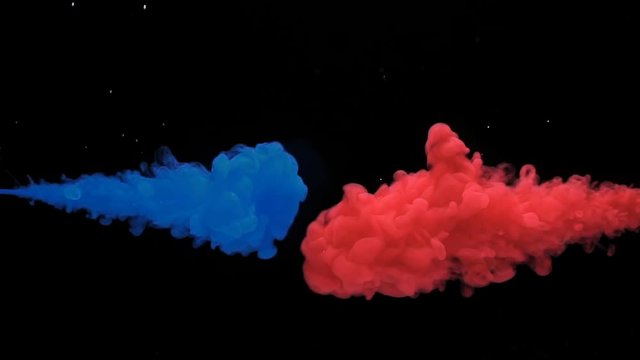 Colorful Ink mixing in water, Slow motion.