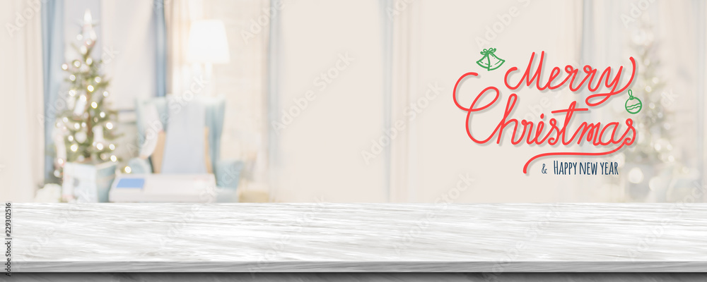 Poster red handwriting merry christmas and happy new year over grey marble table top with abstract warm liv