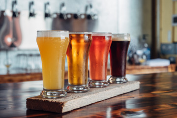 Flight of artizanal beer glasses
