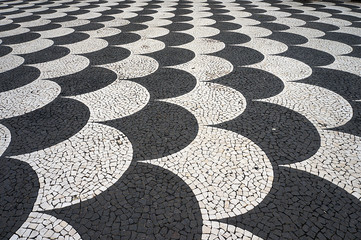 Mosaic tiles pavement pattern in Funchal, Madeira, Portugal.