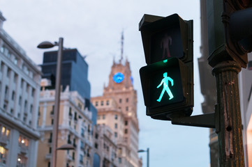 Glowing crosswalk semaphore on street