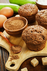 Fototapeta na wymiar Zucchini muffins with cocoa powder