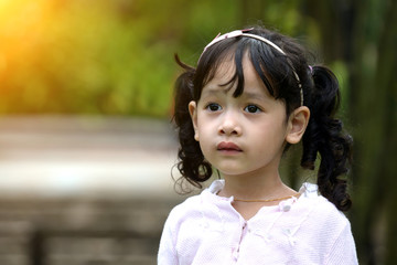 little malay muslim girl playing outdoor