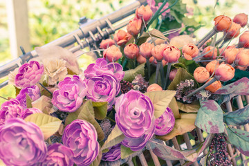 Beautiful flower bouquet in a basket of vintage retro style bicycle.