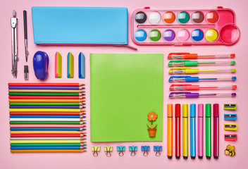 Desktop for the girl with her bright stationery