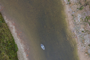 Aerial drone shot of drift boat fly fishing in Ontario, Canada