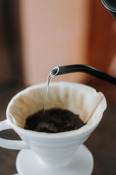 Steady pour into a coffee brewing cone
