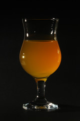 Orange drink in a cocktail glass