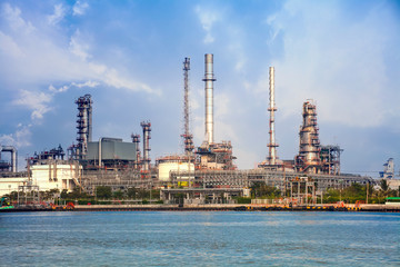 Refinery or petrochemical industry with cloudy sky.