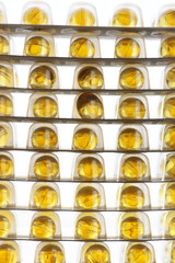 Capsules of cod liver oil in blisters