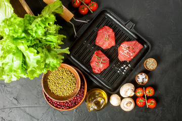 Raw steak fillet with vegetables