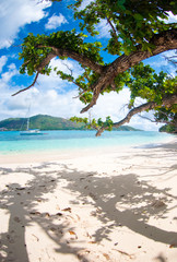Beach and boat in a paradise of Seychelles