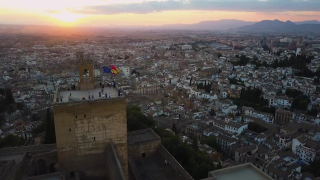 4k drone - Tourists atop medieval castle, The Alhambra.  Granada, Spain.