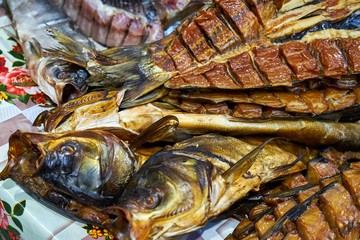 Image of smoked carp on the market in the market.