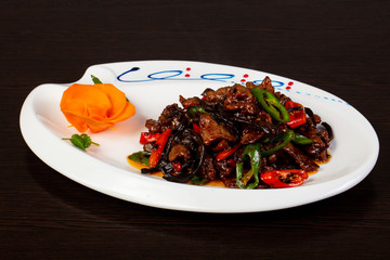 Fried beef with mushrooms