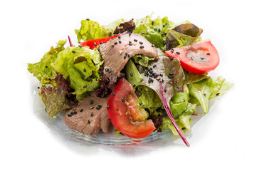 Salad with grilled veal in black sesame with oyster dressing. Asian Lunch