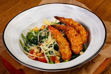 Salad with prawn tempura