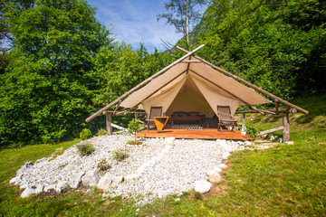 Glamping tent exterior in Adrenaline Check eco camp in Slovenia.