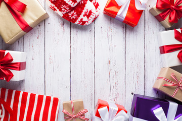 Fototapeta premium Christmas presents on white wooden table