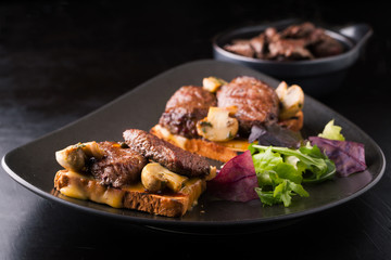 Toast with bacon and beef cutlet with cheese