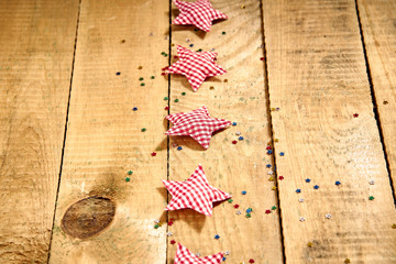 christmas fabric heart on an old wooden table