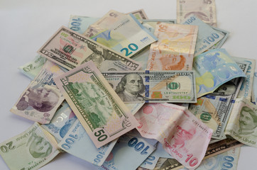 Fototapeta na wymiar Dollar,liras and euro banknotes are on the table.